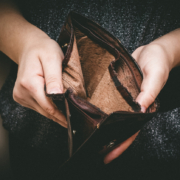 Old empty wallet in the hands