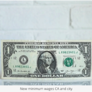 a one dollar bill sitting on top of a table
